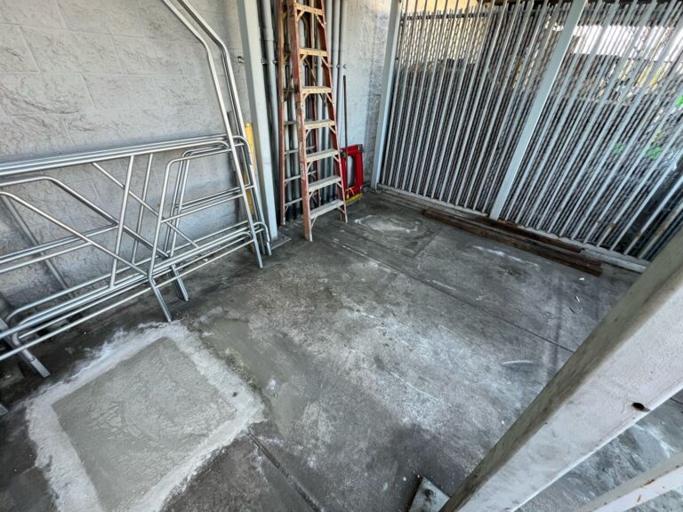 Technician working on complex electrical wiring or control systems.