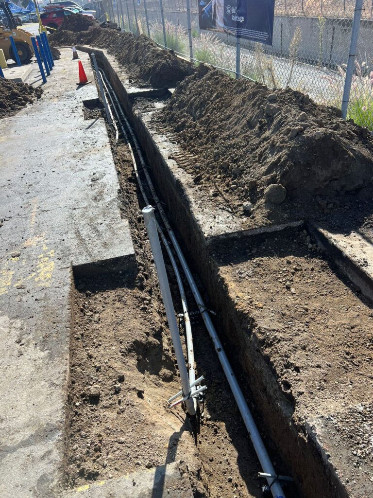 Electrical infrastructure and conduit for the new charging stations before final enclosure.