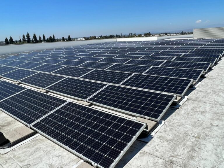 Photo of solar arrays covering a large portion of the Public Storage rooftop.