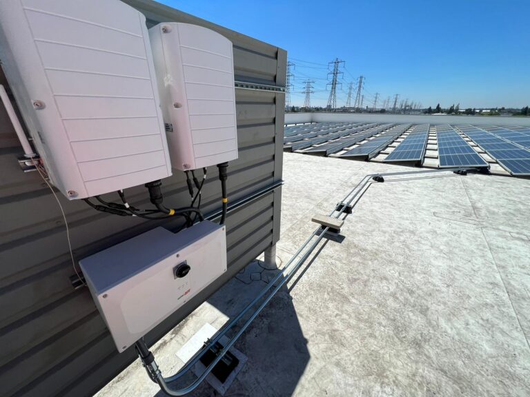 Rooftop solar installation progress at a Public Storage location.